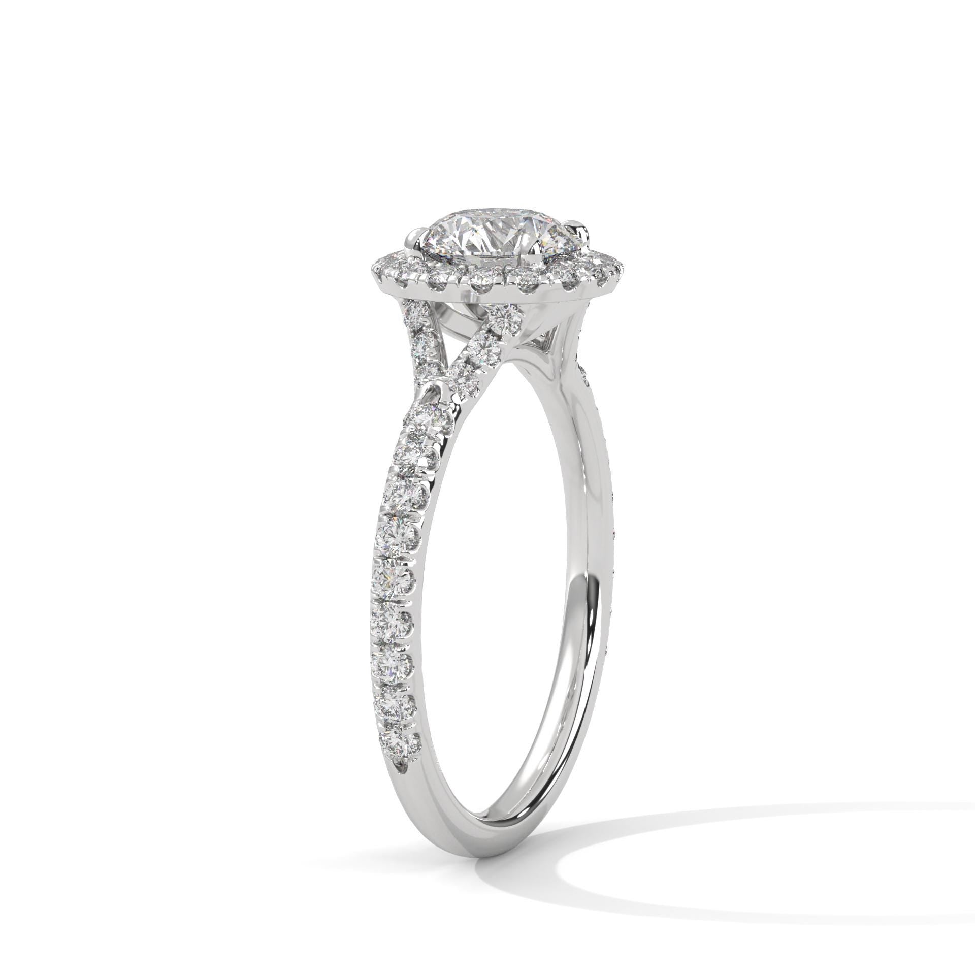 Architectural white gold 4-prong halo setting for round brilliant diamond