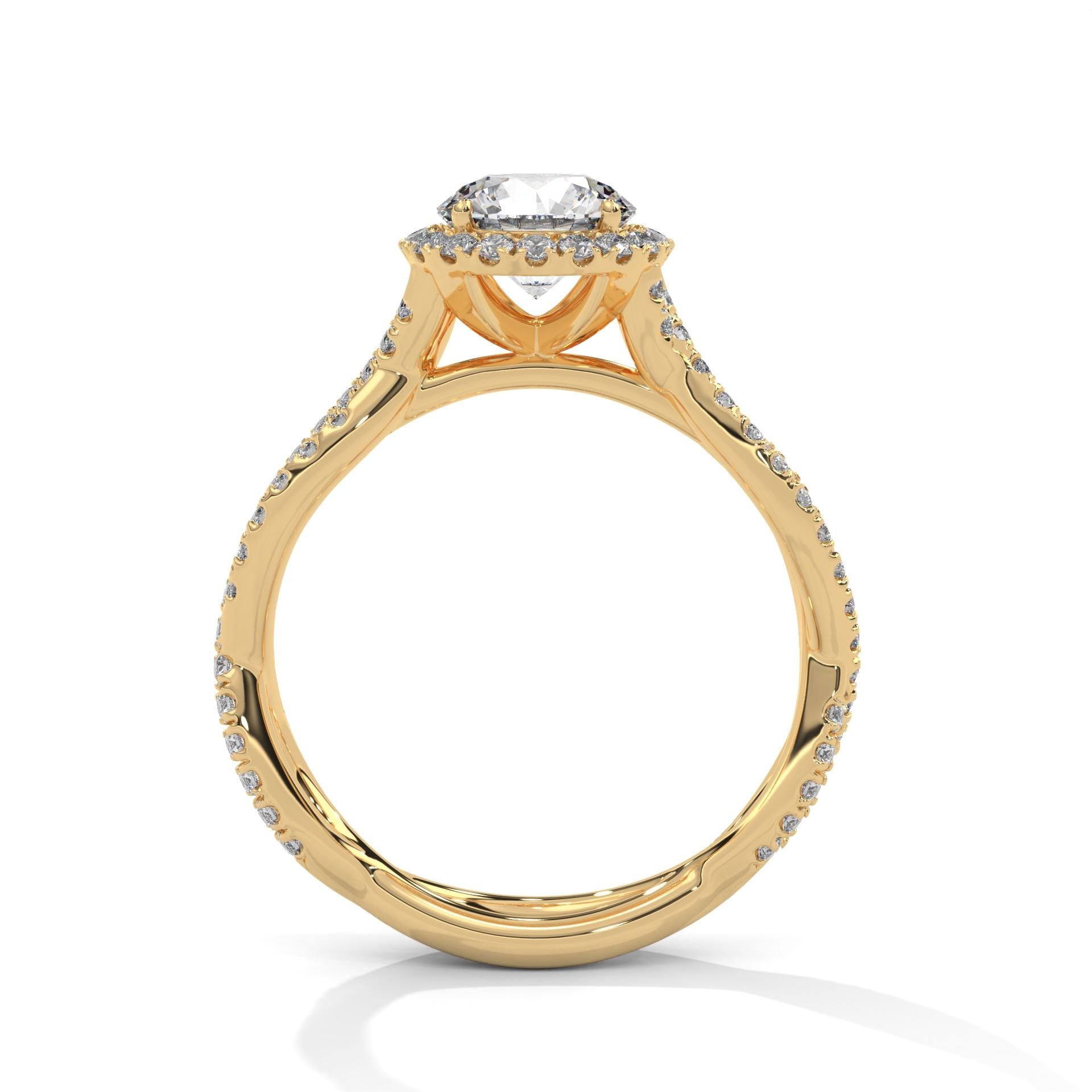Yellow gold round halo solitaire with hand-set micro-pavé diamonds.
