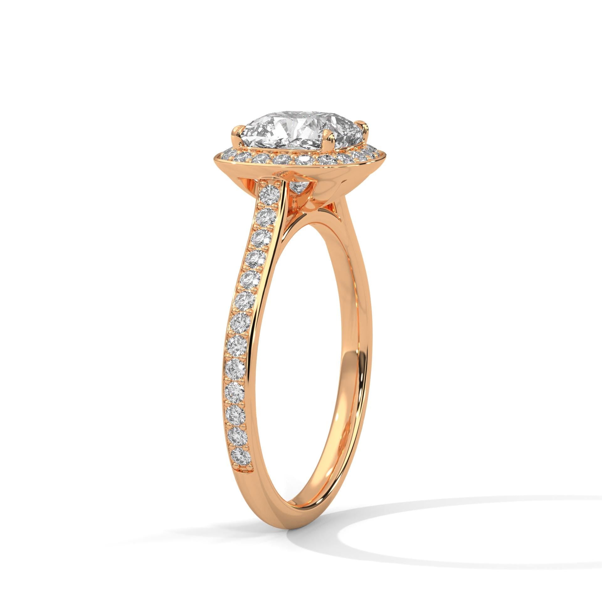 Architectural rose gold 4-prong halo setting for cushion cut diamond