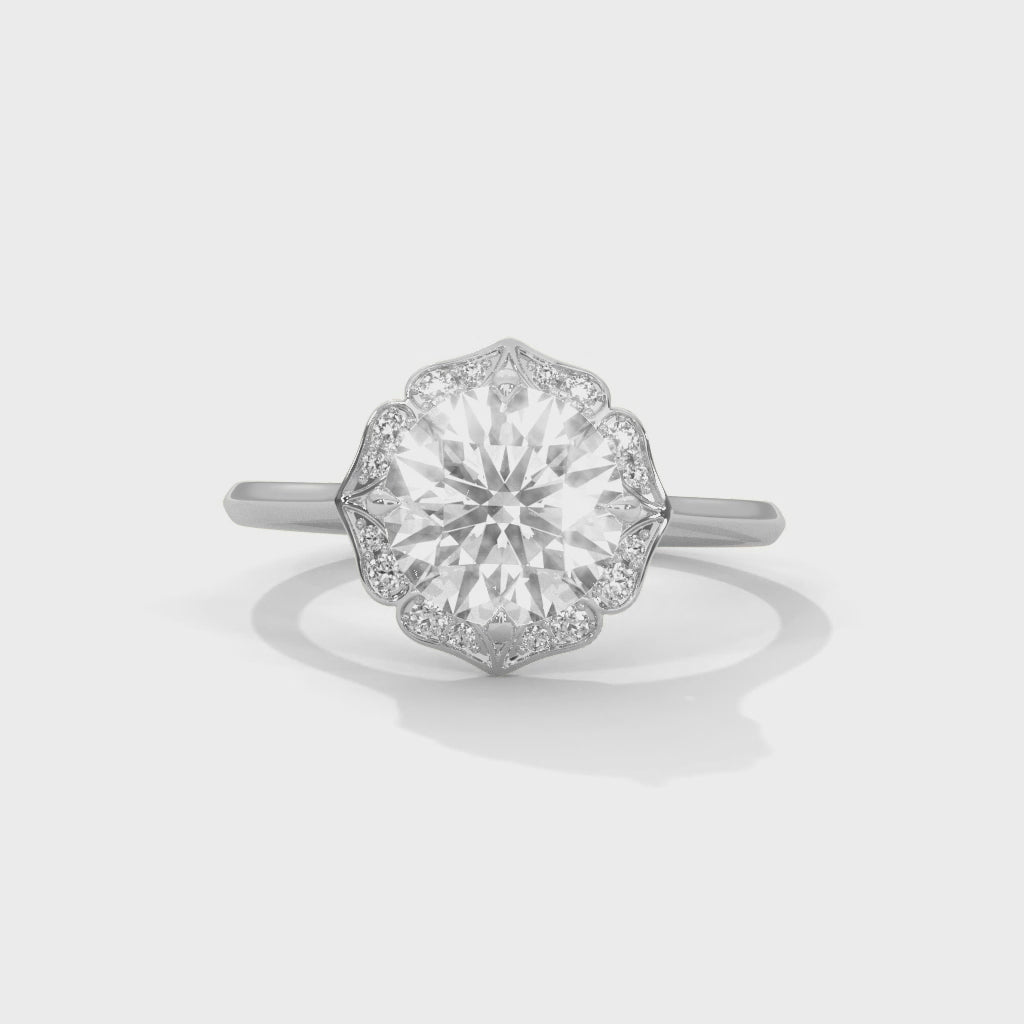 Cinematic video display showcasing the light performance and intricate floral petal detailing of a scalloped halo lab-grown diamond ring.