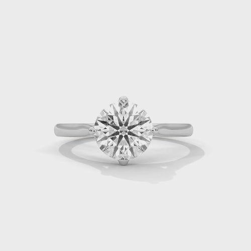Cinematic video showcasing the 360-degree brilliance and fire of a round brilliant lab-grown diamond solitaire ring.