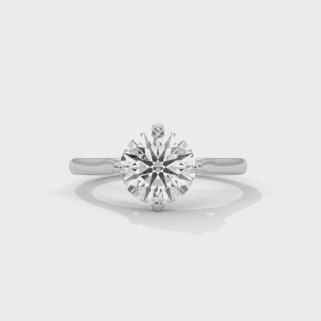 Cinematic video showcasing the 360-degree brilliance and fire of a round brilliant lab-grown diamond solitaire ring.