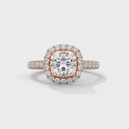 High-definition video showcasing the split light performance of the knife-edge band, the discreet sparkle of the hidden under-halo, and the fire of the radiant cut lab-grown diamond.