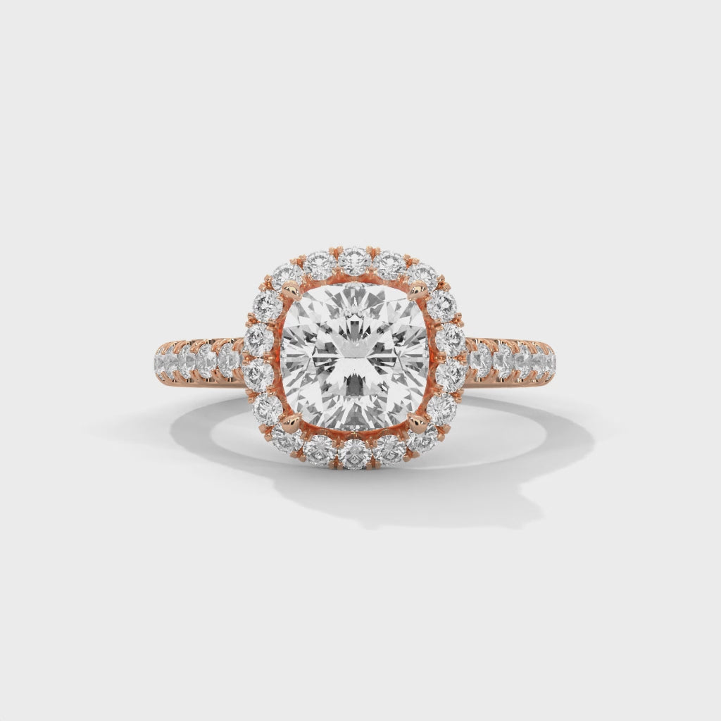 High-definition video showcasing the split light performance of the knife-edge band, the discreet sparkle of the hidden under-halo, and the fire of the radiant cut lab-grown diamond.