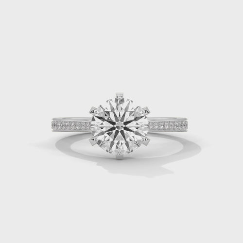 High-definition video showing the fire and light performance of a round brilliant lab-grown diamond on a pavé band.