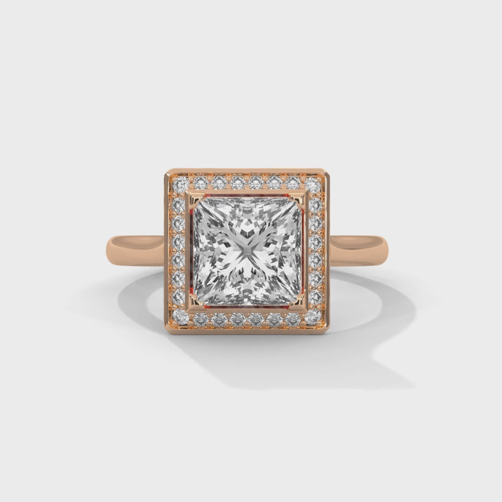 Princess cut elevated square halo engagement ring in rose gold, top-down view of princess cut center stone and square halo