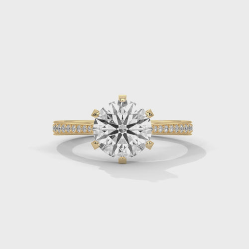 High-definition video showing the fire and light performance of a round brilliant lab-grown diamond on a pavé band.