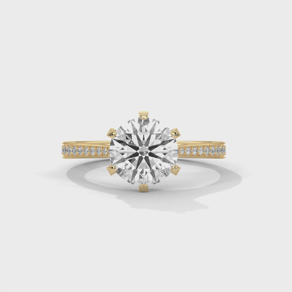 High-definition video showing the fire and light performance of a round brilliant lab-grown diamond on a pavé band.