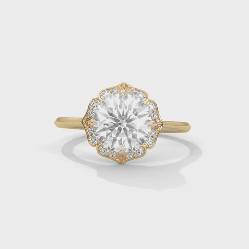 Cinematic video display showcasing the light performance and intricate floral petal detailing of a scalloped halo lab-grown diamond ring.