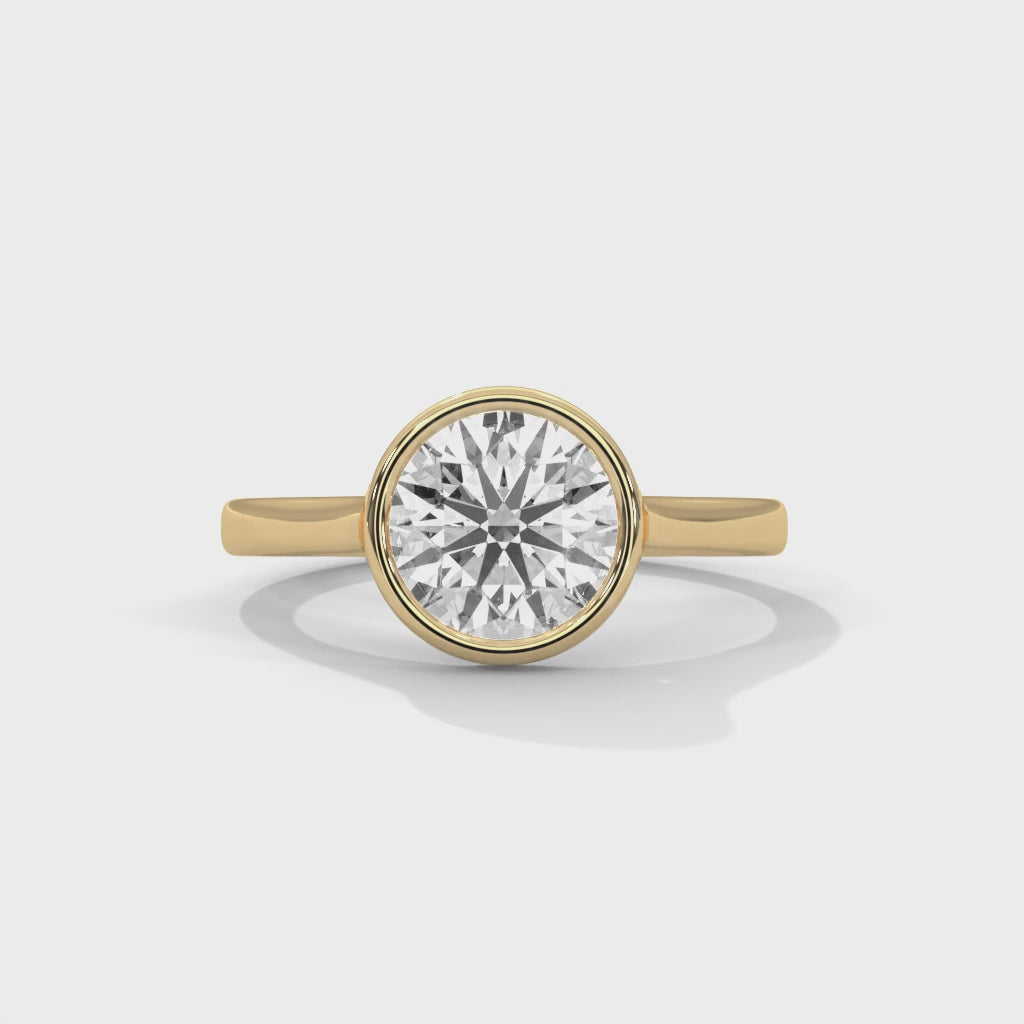 High-definition video showing the modern silhouette, architectural tapered band, and smooth bezel border of the lab-grown diamond solitaire ring.