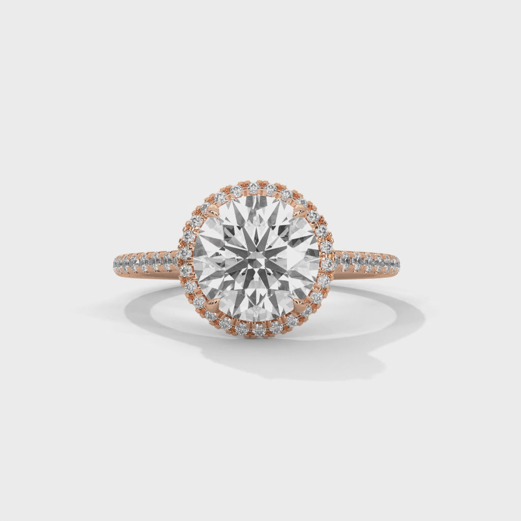 High-definition video showcasing the fire and 360-degree light performance of a round brilliant lab-grown diamond halo ring.