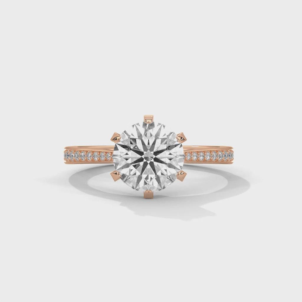 High-definition video showing the fire and light performance of a round brilliant lab-grown diamond on a pavé band.