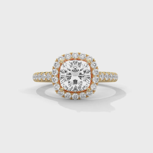 High-definition video showcasing the split light performance of the knife-edge band, the discreet sparkle of the hidden under-halo, and the fire of the radiant cut lab-grown diamond.