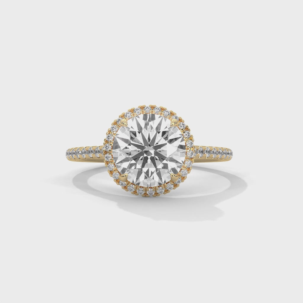 High-definition video showcasing the fire and 360-degree light performance of a round brilliant lab-grown diamond halo ring.