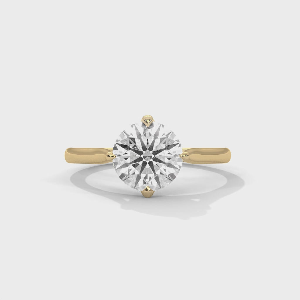 Cinematic video showcasing the 360-degree brilliance and fire of a round brilliant lab-grown diamond solitaire ring.
