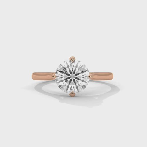 Cinematic video showcasing the 360-degree brilliance and fire of a round brilliant lab-grown diamond solitaire ring.